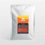 Kota coffee package with a colorful label on a white background