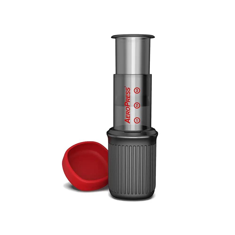 AeroPress Go portable coffee maker with red plunger and black brewing chamber